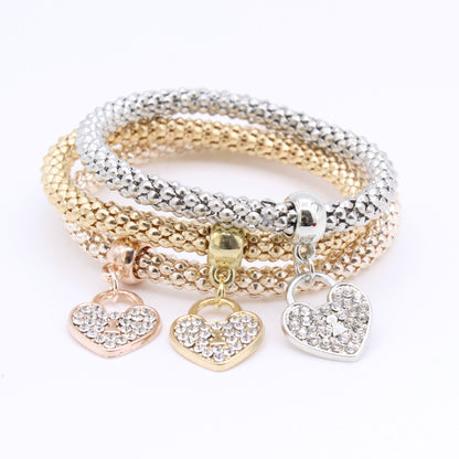 Factory direct European and American women's fashion trend inlaid rhinestone tricolor love personality elastic bracelet bracelet wholesale